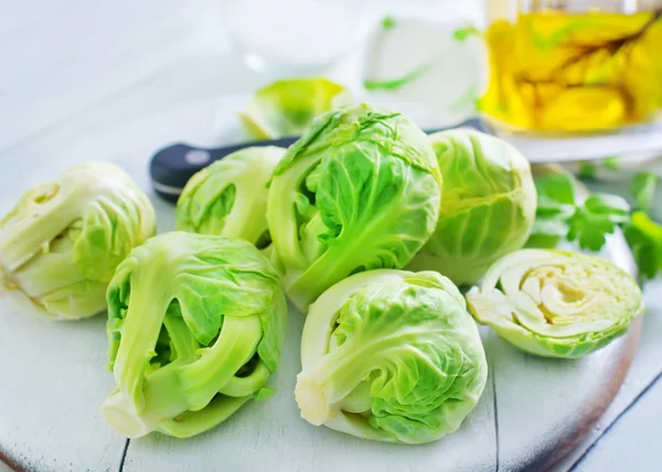 Brussel sprouts on board — Stock Photo, Image