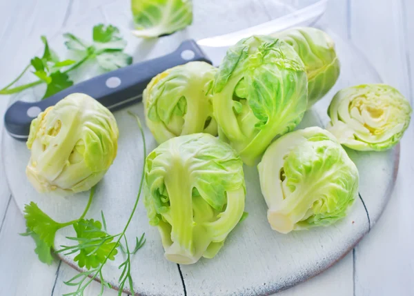 Brussel sprouts on board — Stock Photo, Image