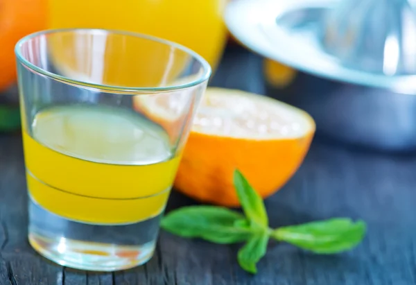 Fresh juice in glass dishware — Stock Photo, Image