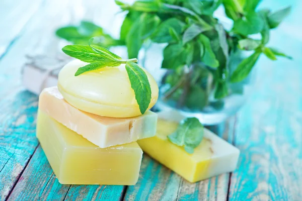 Soap and mint leaves — Stock Photo, Image