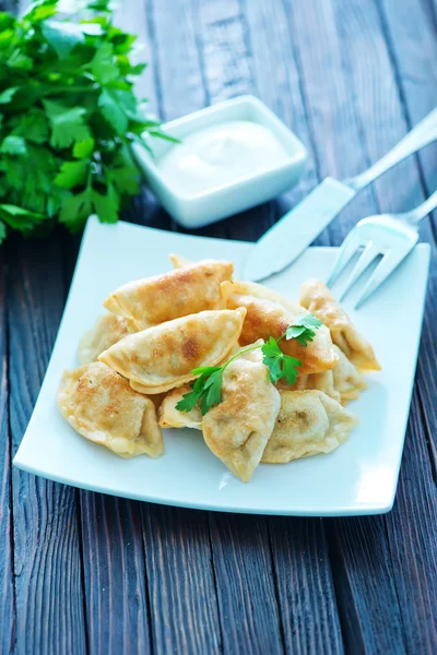 Fried dumplings on the white plate — Stock Photo, Image