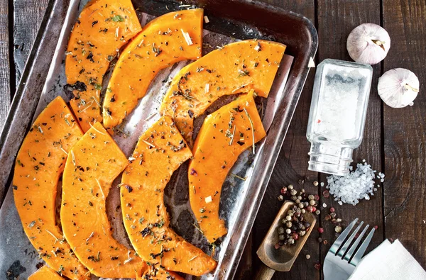 Pumpkin pieces with aroma spice — Stock Photo, Image