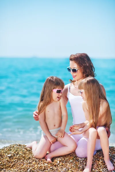 Little girls with their mother — Stock Photo, Image
