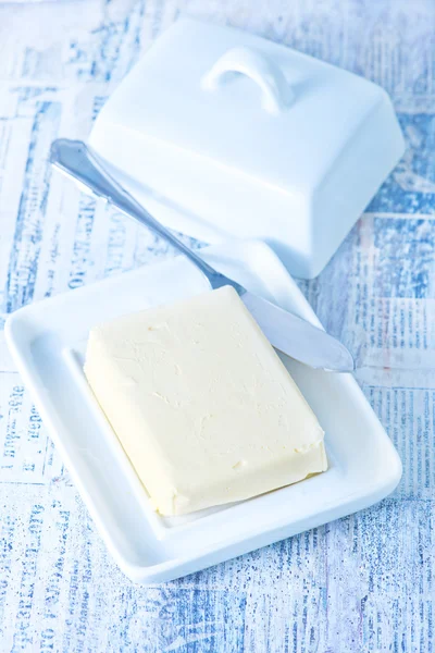 Fresh butter on plate — Stock Photo, Image