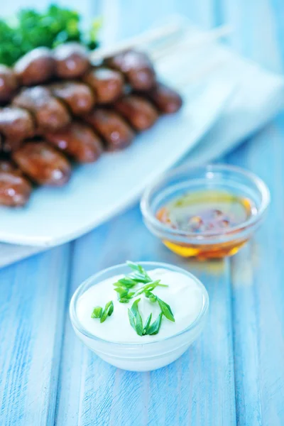 Fried chicken hearts with sauces — Stock Photo, Image