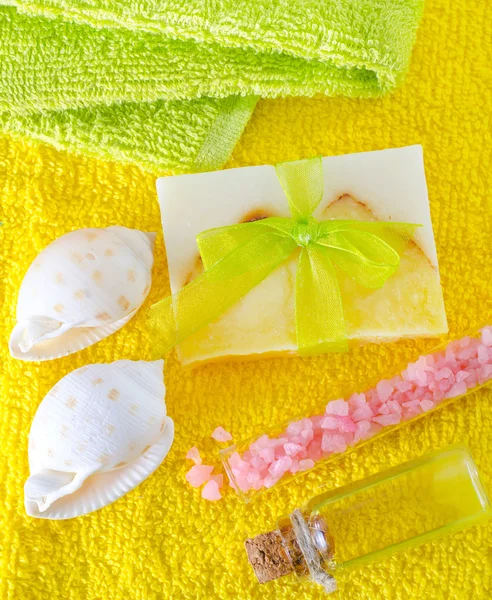 Sea salt, soap and towels — Stock Photo, Image