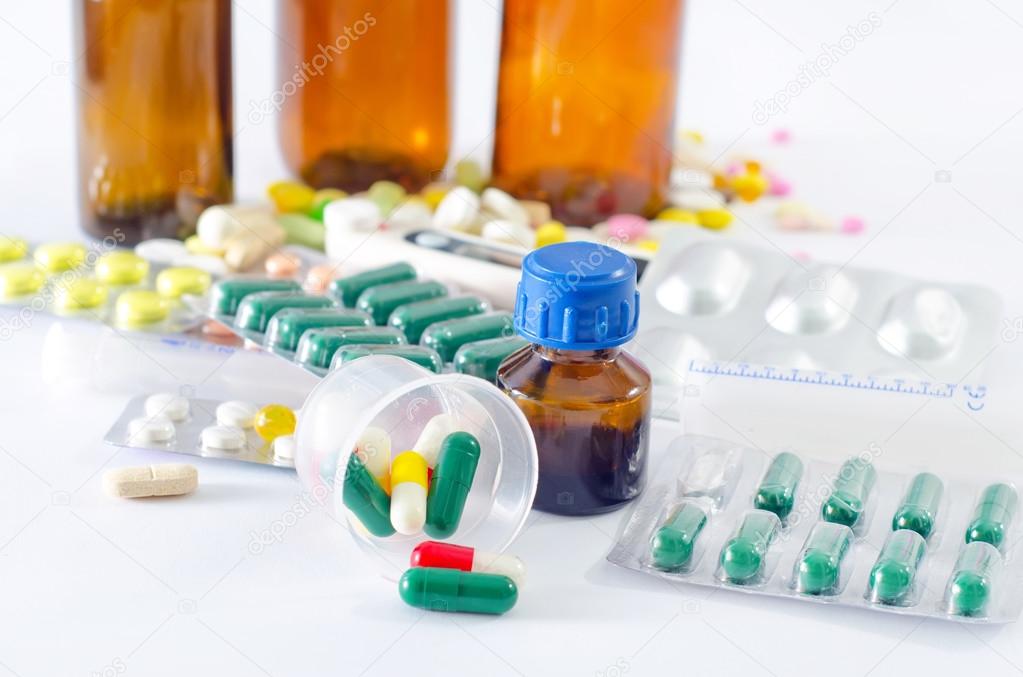 color pills and medical bottle 