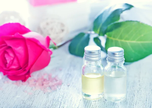 Rose oil in bottle — Stock Photo, Image
