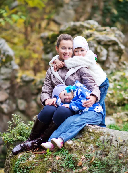 Happy family in park — Stock Photo, Image