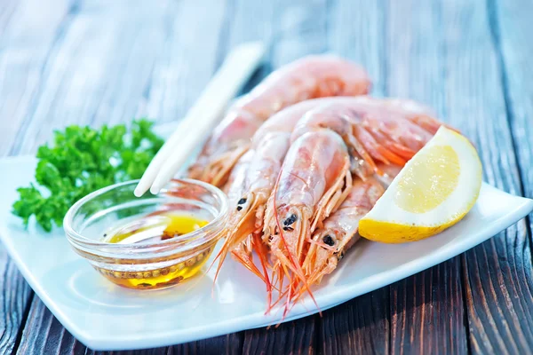 Fried shrimps on white plate — Stock Photo, Image