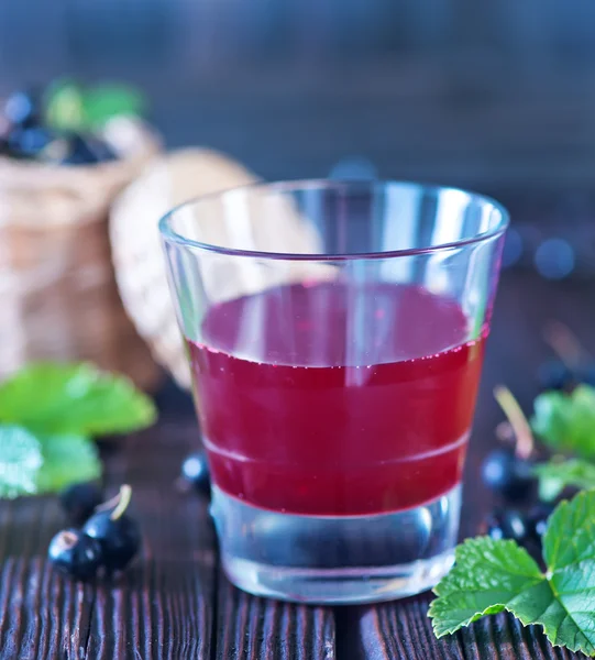 Black currant juice in glass — Stock Photo, Image