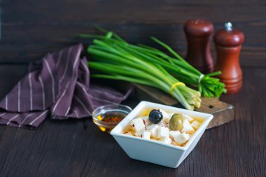 Cheese with oil and spices