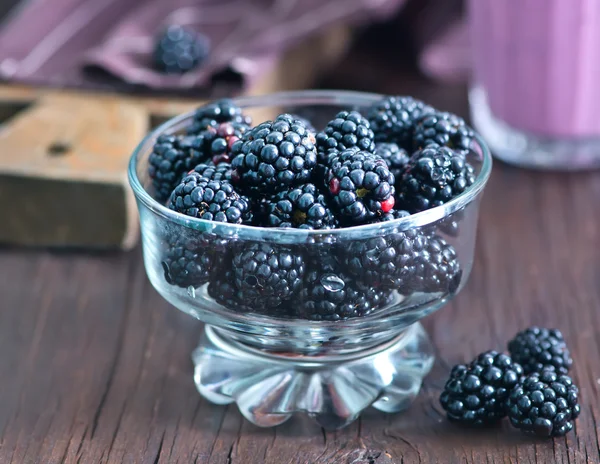 Yogurt with blackberries in bowl