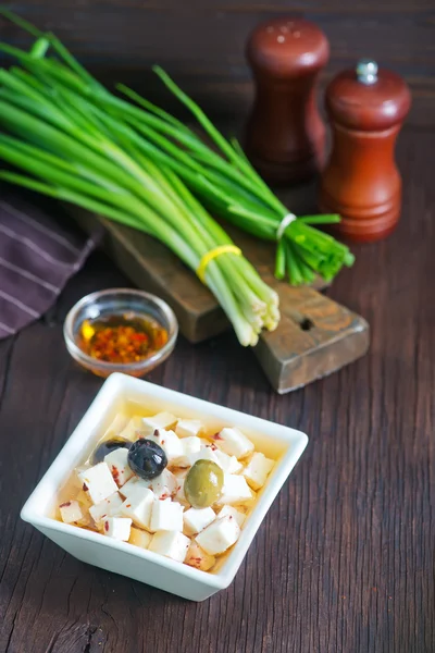 Cheese with oil and spices