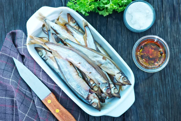 Smoked fish with spices — Stock Photo, Image