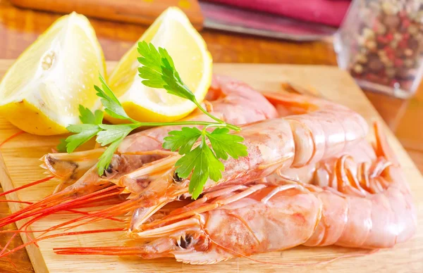 Fresh prawns on a wood — Stock Photo, Image