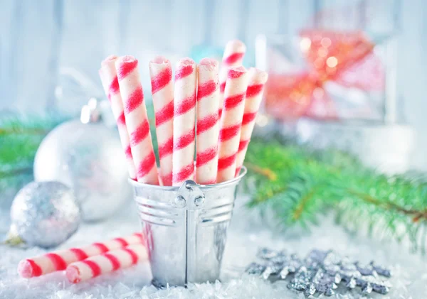 Biscuit sticks and christmas decoration — Stock Photo, Image