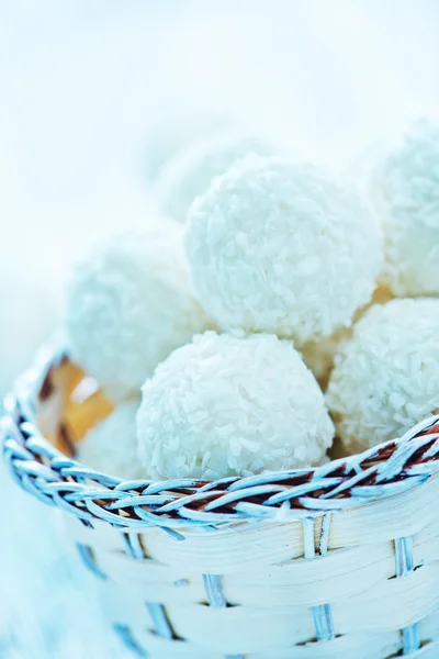 Coconut candies in basket — Stock Photo, Image