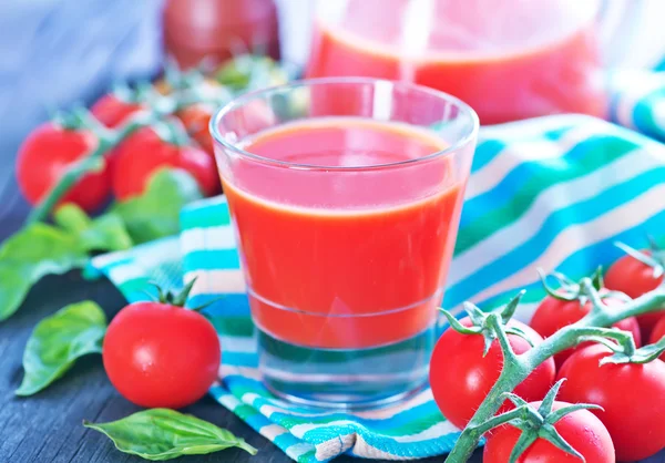 Tomato juice in glass — Stock Photo, Image