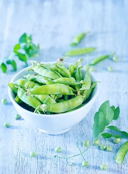 Green peas on bowl — Stock Photo, Image