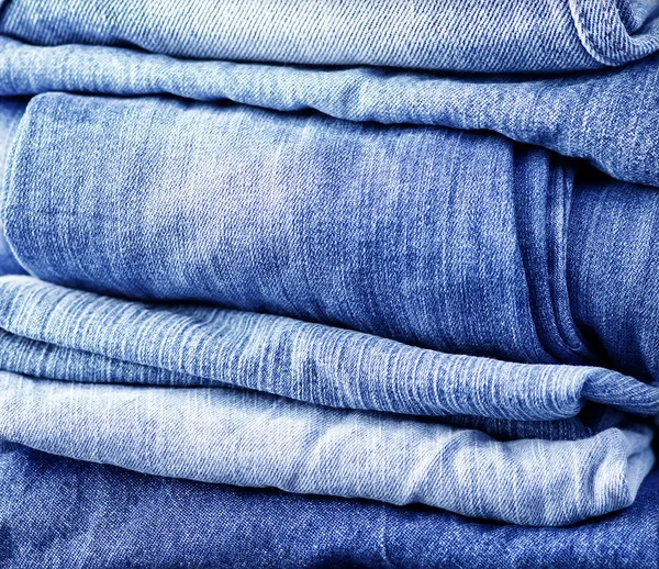 Stack of denim  jeans — Stock Photo, Image