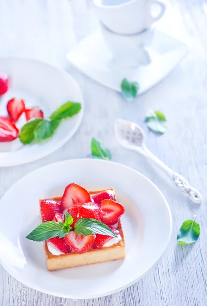 Pieces of cake with strawberries — Stock Photo, Image