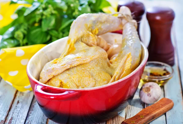 Raw chicken with spices — Stock Photo, Image