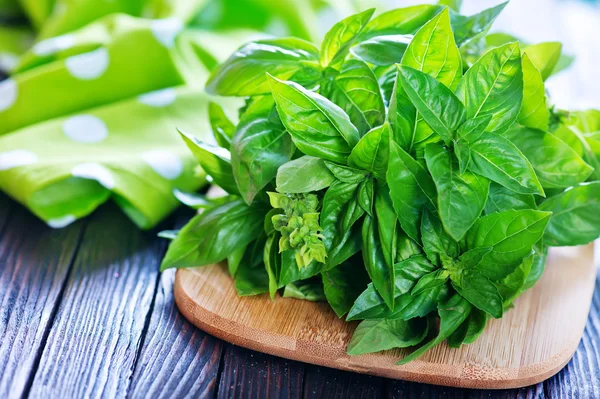 Fresh basil on board — Stock Photo, Image