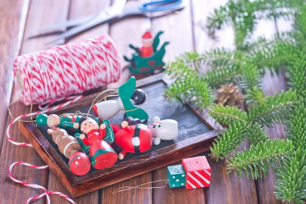 Christmas decorations on table — Stock Photo, Image