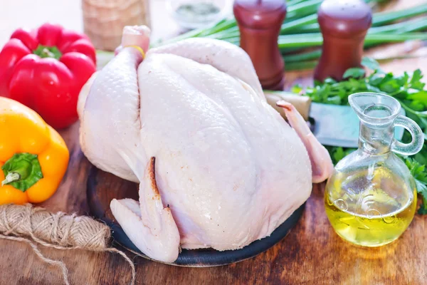 Raw chicken with spice — Stock Photo, Image