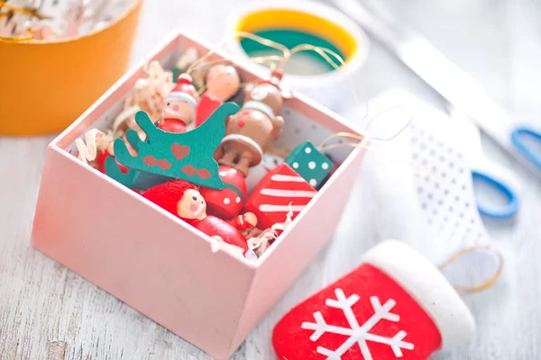 Christmas decorations in box — Stock Photo, Image