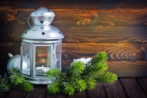 Christmas lamp op rustieke tabel — Stockfoto