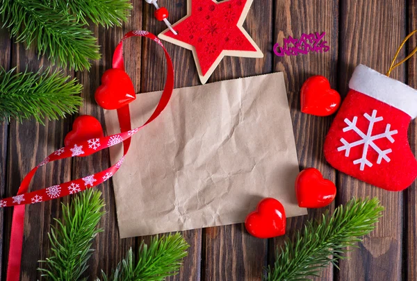 Weihnachtsdekoration und altes Papier — Stockfoto