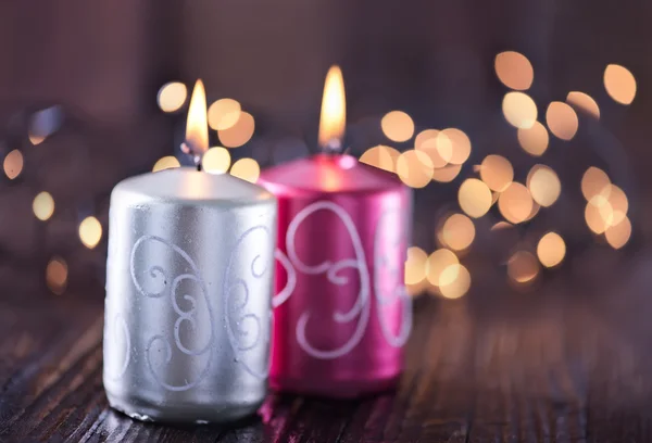 Christmas silver and red candles — Stock Photo, Image
