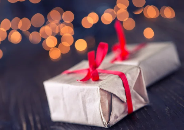 Christmas gifts on table — Stock Photo, Image