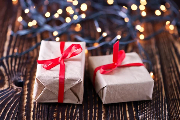 Christmas gifts on table — Stock Photo, Image