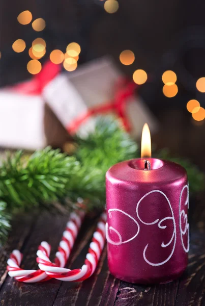 Christmas decoration and candle — Stock Photo, Image