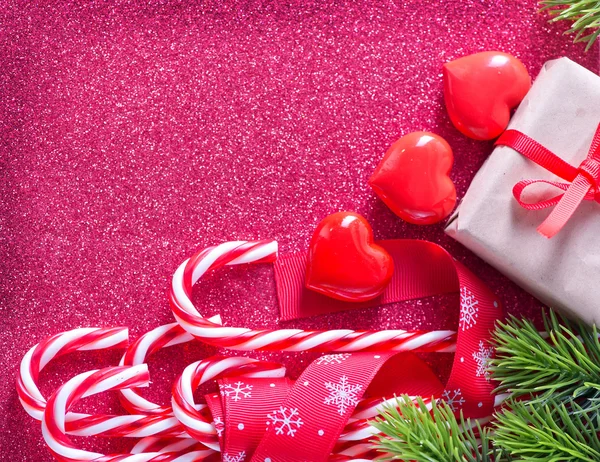 Christmas candies and hearts — Stock Photo, Image
