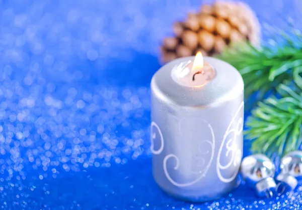 Christmas decoration and candle — Stock Photo, Image