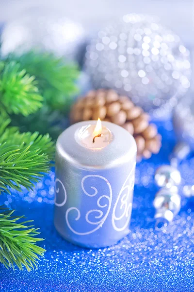 Christmas decoration and candle — Stock Photo, Image