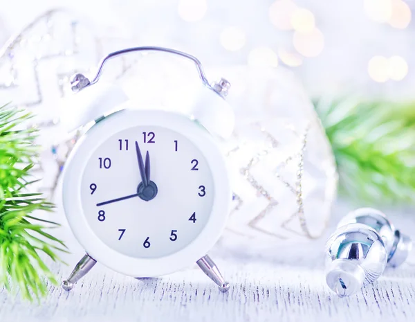 Christmas decoration and clock — Stock Photo, Image