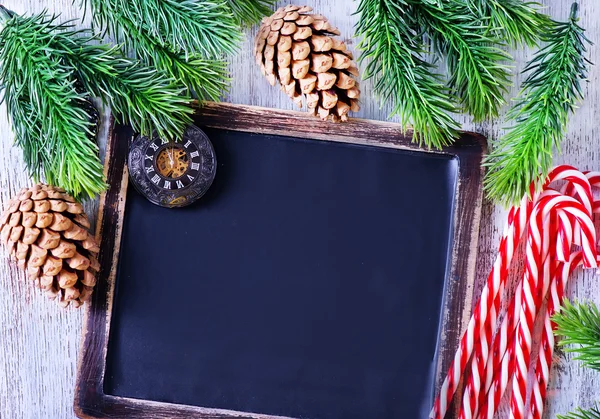 Empty blackboard, candy canes — Stock Photo, Image