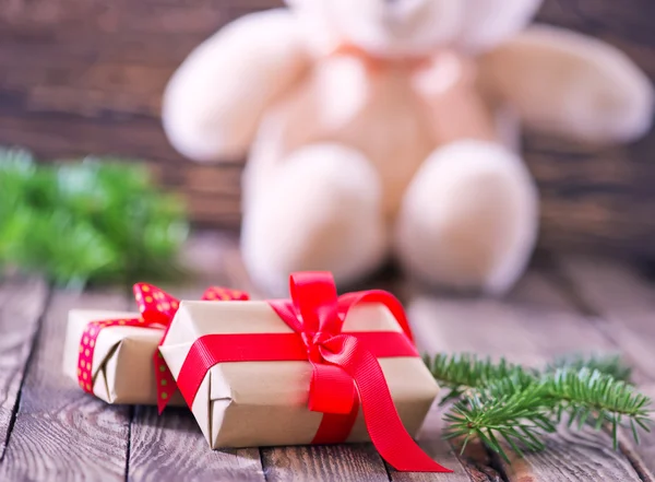 Presents and teddy bear — Stock Photo, Image