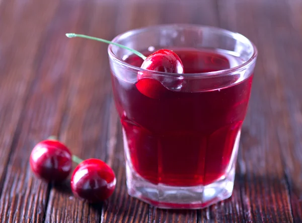Cherry drink in glass — стоковое фото