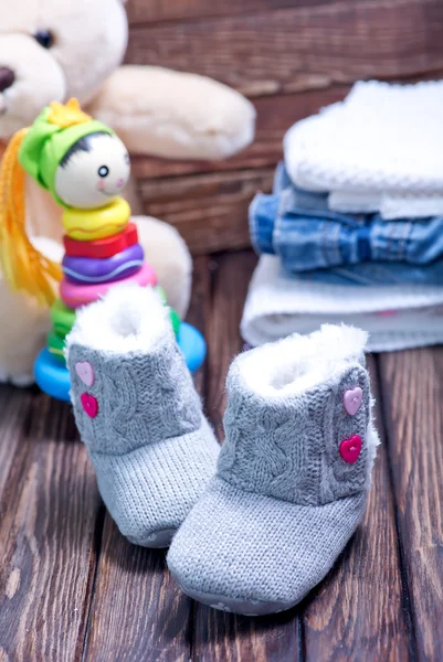 Babykleding en schoenen — Stockfoto