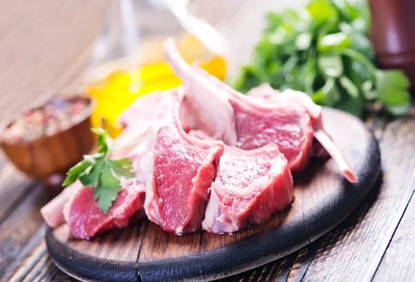Raw meat with spice — Stock Photo, Image