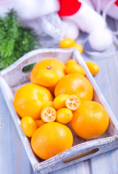 Fresh tangerines and kumquats — Stock fotografie