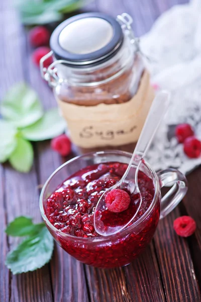 Raspberry jam in cup — Stock Photo, Image