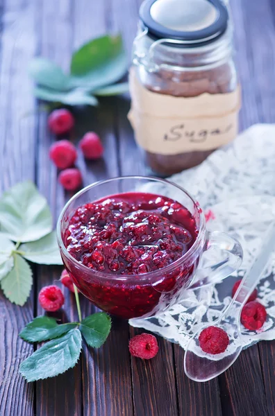 Raspberry jam in cup — Stock Photo, Image