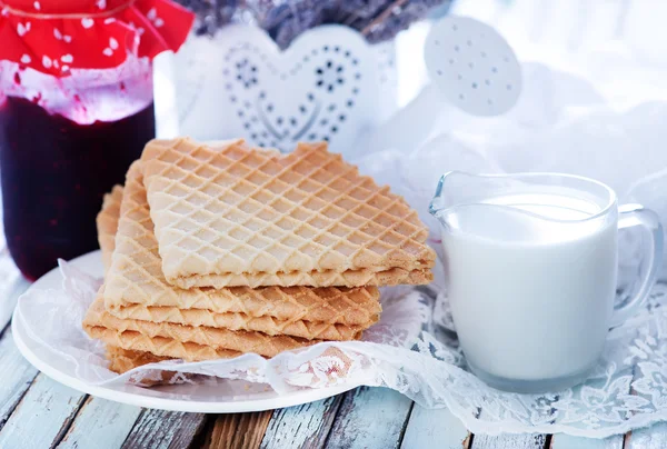 Waffles on plate with jam — Stock Photo, Image